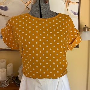 Yellow and white polkadot top